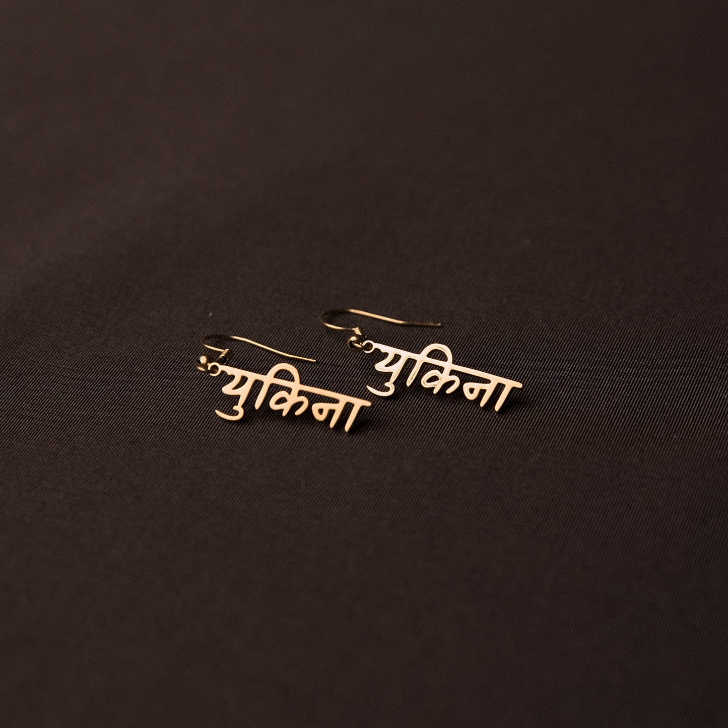 Name earrings Devanagari script